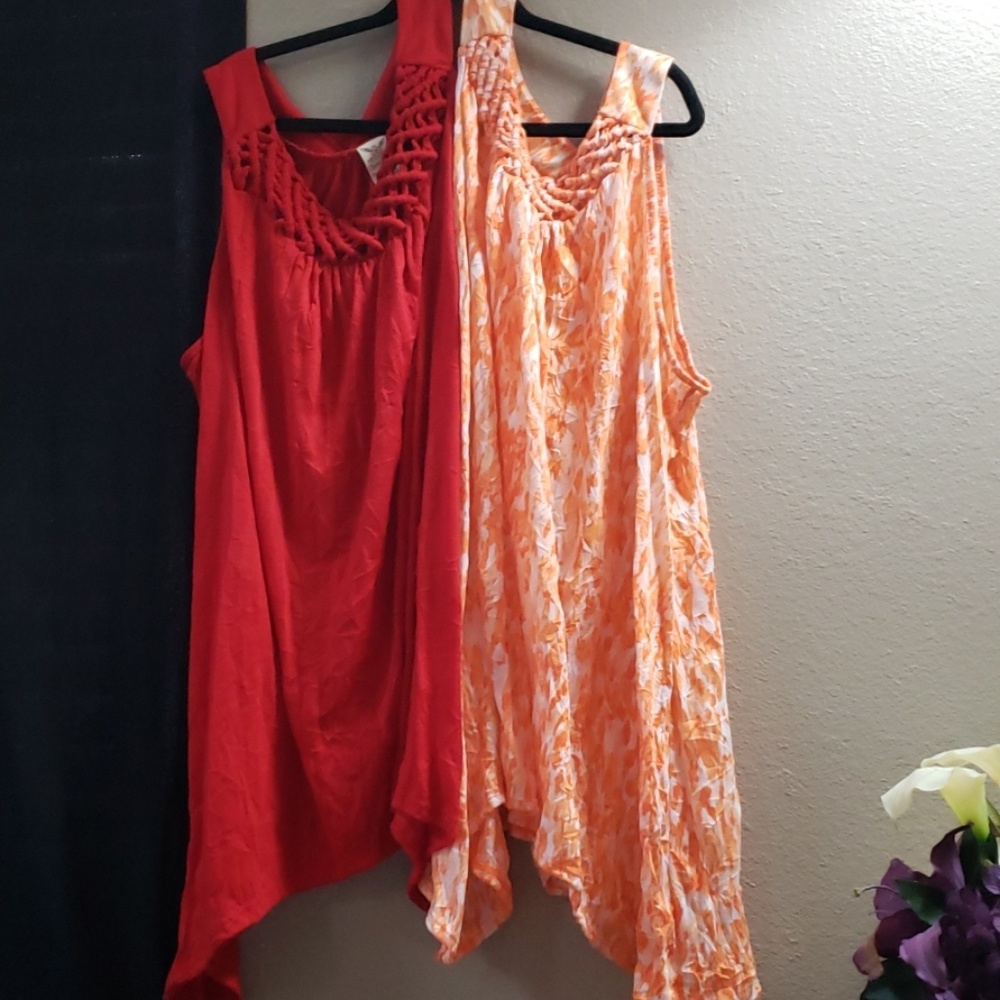 Two sharkbite hem tank tops